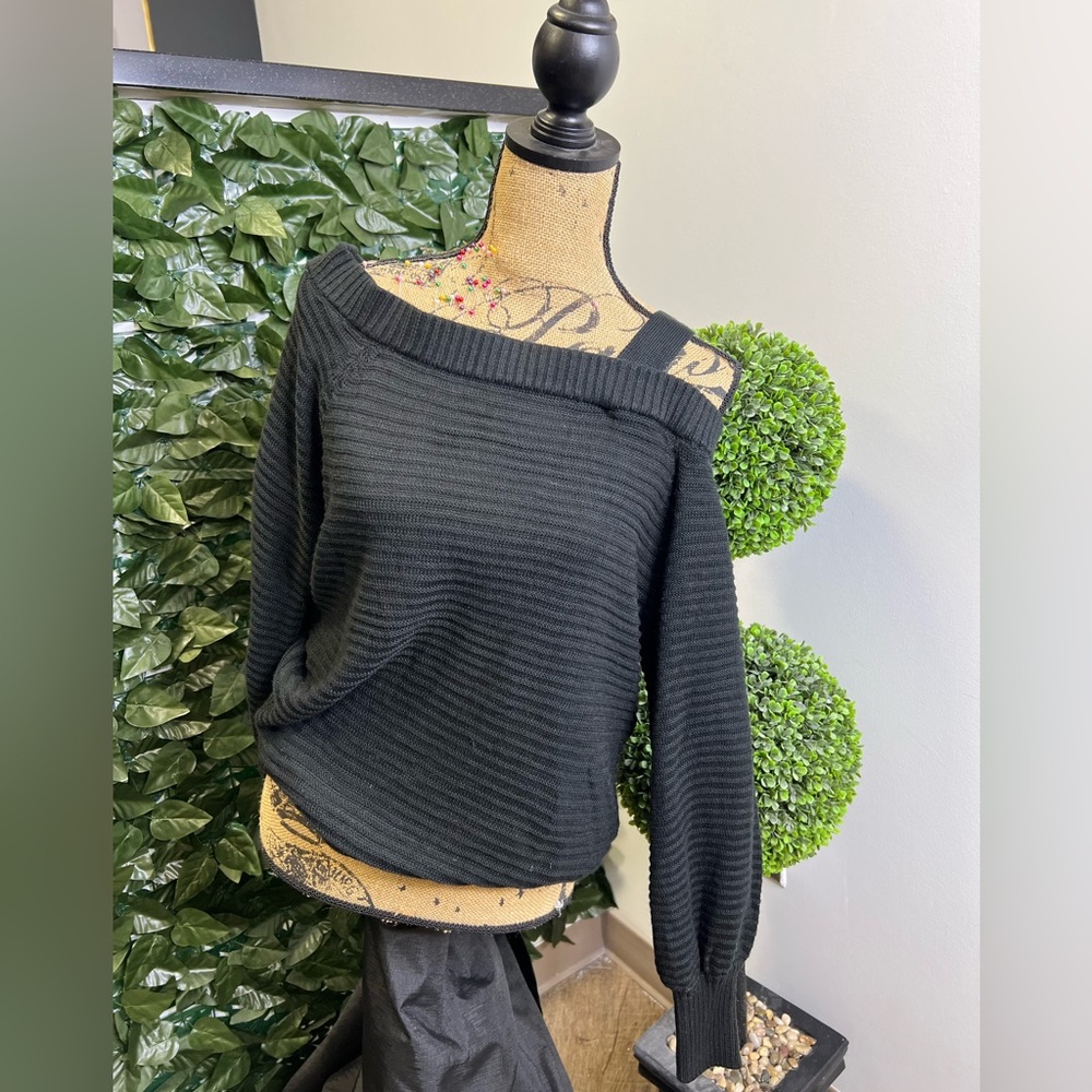 Black exposed shoulder sweater